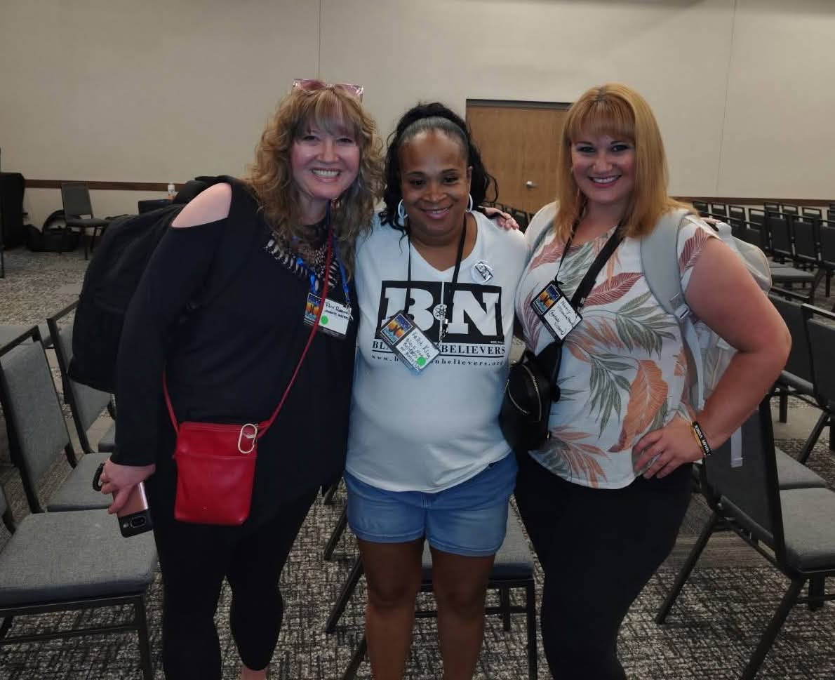 Nancy with two other attendees, morning of July 27, 2025